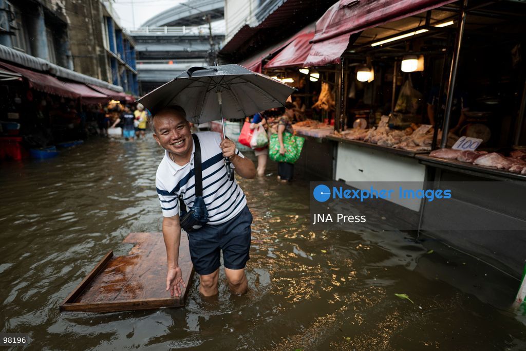 BANGKOK, THAILAND – SEPTEMBER 27, 2026: Heavy rain caused widespread flooding across Bangkok, affecting residents, businesses and communities across the capital. The Thai Meteorological Department attributed the rainfall to a low-pressure system over the Central region combined with the southwest monsoon, with further rain expected through September 27. Bangkok authorities declared all 50 districts disaster-affected areas and deployed pumps, shelters and emergency teams to assist affected residents and drain accumulated floodwater. By Sunday, water levels had begun to recede in some areas, although flooding persisted in several low-lying communities as authorities continued monitoring water levels and providing assistance. Photo by Captain Jirathummanuwat / JNA Press. (Photo by Captain Jirathummanuwat/JNA Press via Nexpher Images)