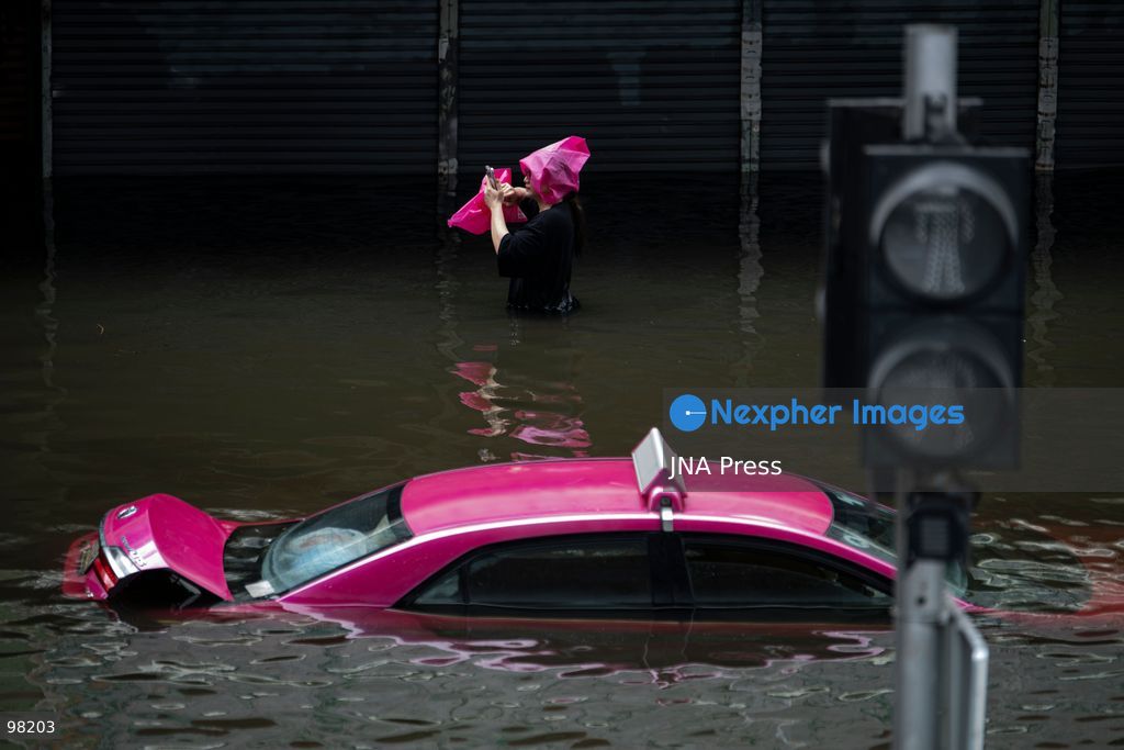 BANGKOK, THAILAND – SEPTEMBER 27, 2026: Heavy rain caused widespread flooding across Bangkok, affecting residents, businesses and communities across the capital. The Thai Meteorological Department attributed the rainfall to a low-pressure system over the Central region combined with the southwest monsoon, with further rain expected through September 27. Bangkok authorities declared all 50 districts disaster-affected areas and deployed pumps, shelters and emergency teams to assist affected residents and drain accumulated floodwater. By Sunday, water levels had begun to recede in some areas, although flooding persisted in several low-lying communities as authorities continued monitoring water levels and providing assistance. Photo by Captain Jirathummanuwat / JNA Press. (Photo by Captain Jirathummanuwat/JNA Press via Nexpher Images)