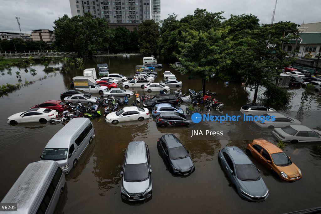 BANGKOK, THAILAND – SEPTEMBER 27, 2026: Heavy rain caused widespread flooding across Bangkok, affecting residents, businesses and communities across the capital. The Thai Meteorological Department attributed the rainfall to a low-pressure system over the Central region combined with the southwest monsoon, with further rain expected through September 27. Bangkok authorities declared all 50 districts disaster-affected areas and deployed pumps, shelters and emergency teams to assist affected residents and drain accumulated floodwater. By Sunday, water levels had begun to recede in some areas, although flooding persisted in several low-lying communities as authorities continued monitoring water levels and providing assistance. Photo by Captain Jirathummanuwat / JNA Press. (Photo by Captain Jirathummanuwat/JNA Press via Nexpher Images)