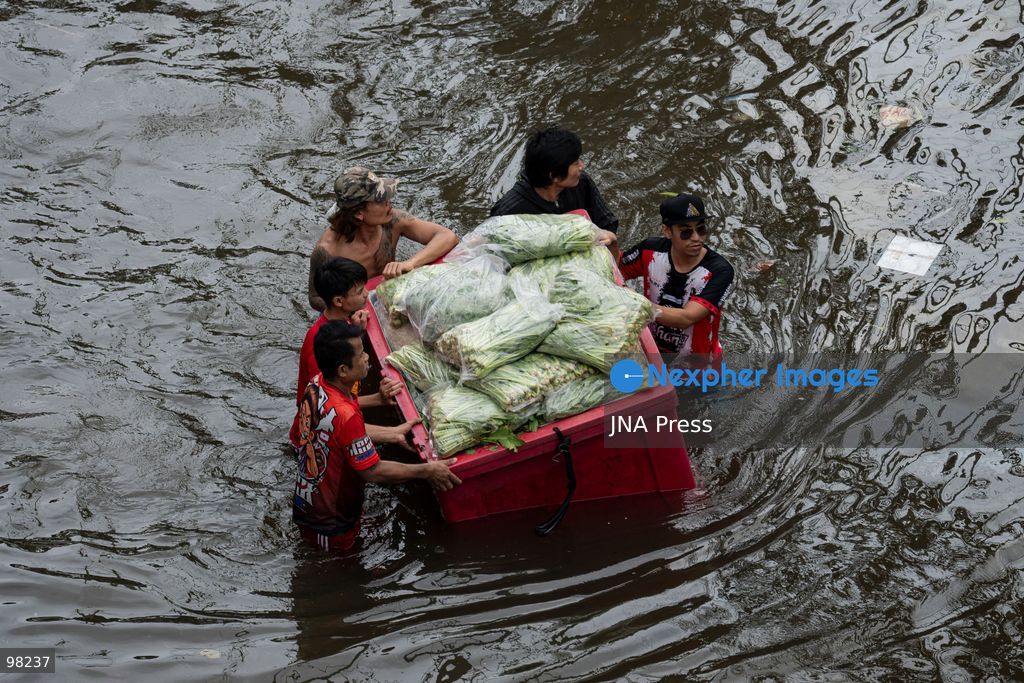 BANGKOK, THAILAND – SEPTEMBER 27, 2026: Heavy rain caused widespread flooding across Bangkok, affecting residents, businesses and communities across the capital. The Thai Meteorological Department attributed the rainfall to a low-pressure system over the Central region combined with the southwest monsoon, with further rain expected through September 27. Bangkok authorities declared all 50 districts disaster-affected areas and deployed pumps, shelters and emergency teams to assist affected residents and drain accumulated floodwater. By Sunday, water levels had begun to recede in some areas, although flooding persisted in several low-lying communities as authorities continued monitoring water levels and providing assistance. Photo by Captain Jirathummanuwat / JNA Press. (Photo by Captain Jirathummanuwat/JNA Press via Nexpher Images)