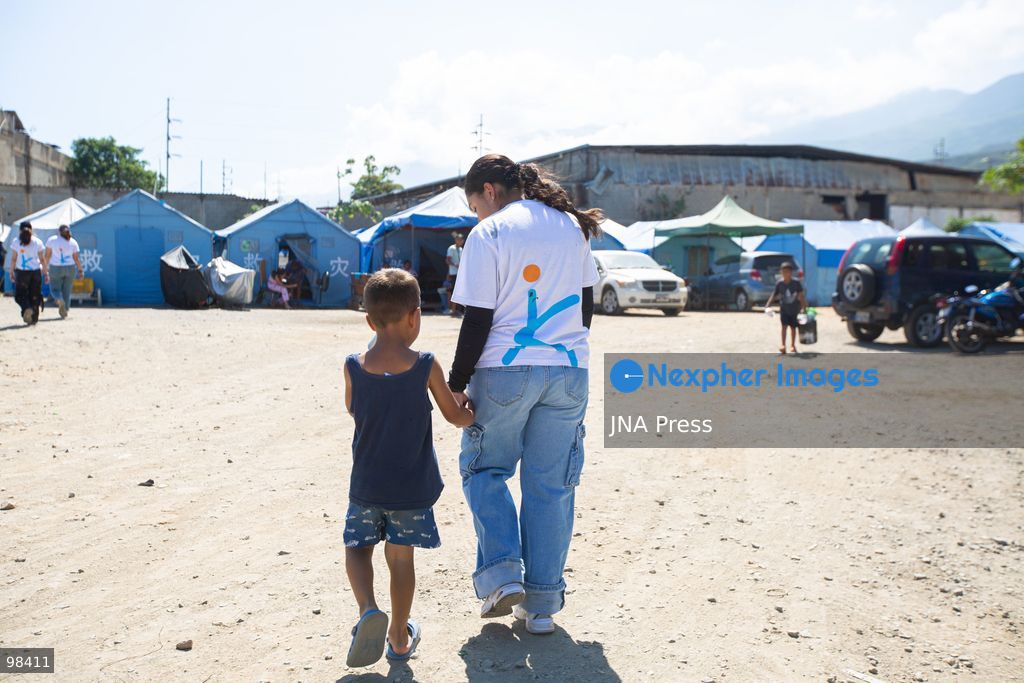 LA GUAIRA, VENEZUELA – SEPTEMBER 27, 2026: Survivors of the twin earthquakes that struck La Guaira state continued living in tents around damaged buildings three months after the earthquakes. Non-governmental organizations provided residents with water and food, while schooling was provided for children living in the affected area. The earthquake survivors continued their daily lives in temporary shelters as they received humanitarian assistance. The situation reflected the ongoing impact of the earthquakes on residents whose homes and surrounding buildings were damaged. Photo by Marcos Adrian Gandica / JNA Press. (Photo by Marcos Adrian Gandica/JNA Press via Nexpher Images)