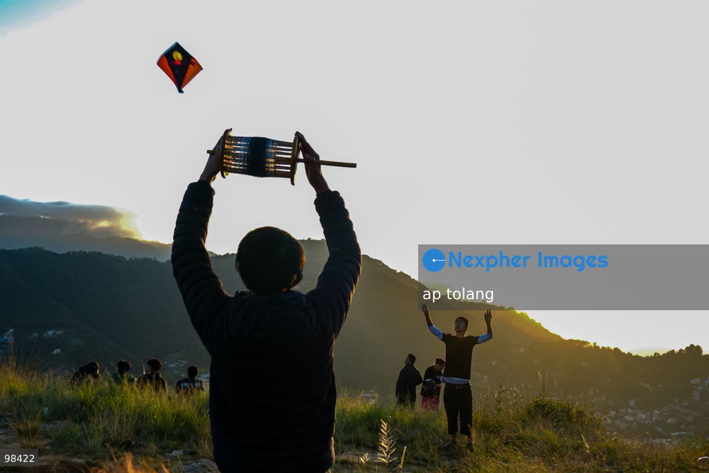 KATHMANDU, NEPAL —September 27, 2026: People fly colorful kites during sunset in a hill station on the outskirts of Kathmandu, Nepal. (Photo by ap tolang/Nexpher Images)