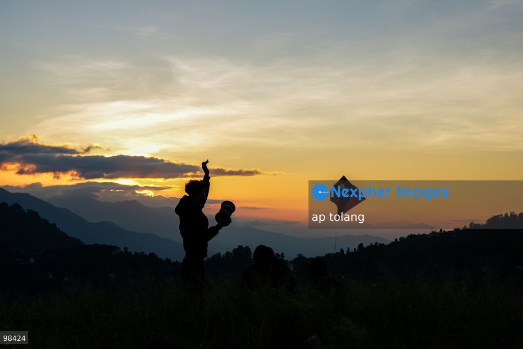 KATHMANDU, NEPAL —September 27, 2026: People fly colorful kites during sunset in a hill station on the outskirts of Kathmandu, Nepal. (Photo by ap tolang/Nexpher Images)