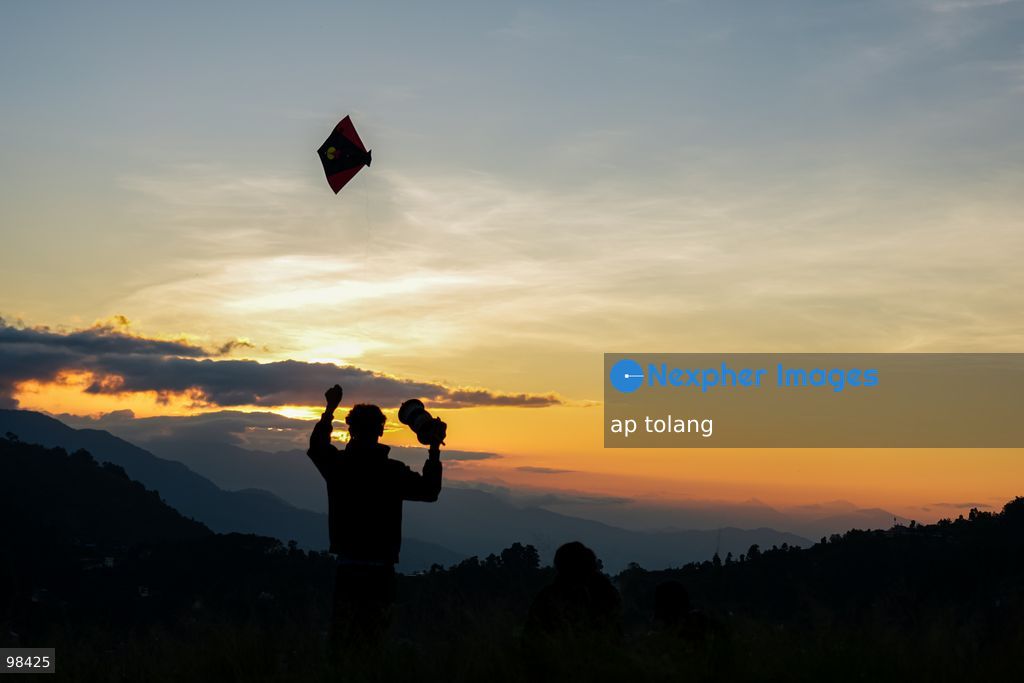 KATHMANDU, NEPAL —September 27, 2026: People fly colorful kites during sunset in a hill station on the outskirts of Kathmandu, Nepal. (Photo by ap tolang/Nexpher Images)