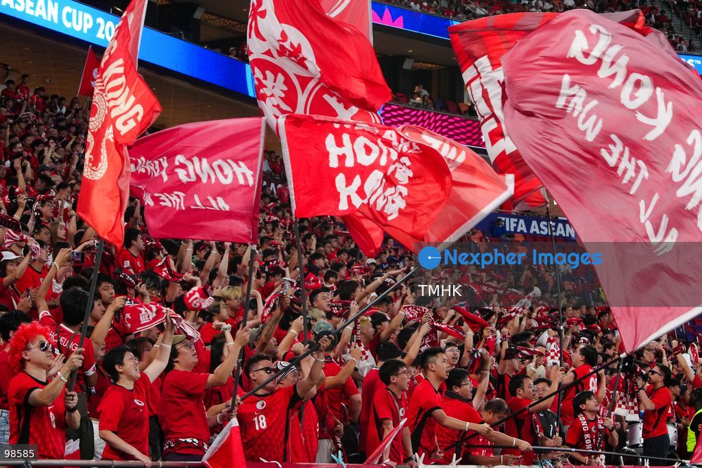 Passionate supporters wave red team colours, clap, and chant slogans to back Hong Kong, China during their FIFA ASEAN Cup Tier 2 match against Laos at Kai Tak Stadium on September 27, 2026 in Hong Kong, where a lively crowd of nearly 19,000 cheered on the home side. (Photo by Zulu Lo/TMHK via Nexpher Images)