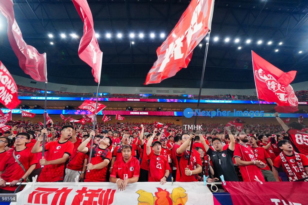 Passionate supporters wave red team colours, clap, and chant slogans to back Hong Kong, China during their FIFA ASEAN Cup Tier 2 match against Laos at Kai Tak Stadium on September 27, 2026 in Hong Kong, where a lively crowd of nearly 19,000 cheered on the home side. (Photo by Zulu Lo/TMHK via Nexpher Images)