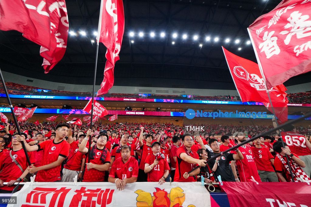 Passionate supporters wave red team colours, clap, and chant slogans to back Hong Kong, China during their FIFA ASEAN Cup Tier 2 match against Laos at Kai Tak Stadium on September 27, 2026 in Hong Kong, where a lively crowd of nearly 19,000 cheered on the home side. (Photo by Zulu Lo/TMHK via Nexpher Images)