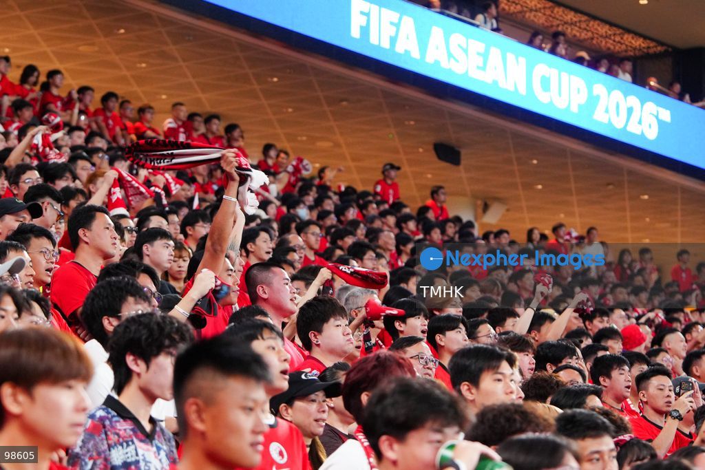 Passionate supporters wave red team colours, clap, and chant slogans to back Hong Kong, China during their FIFA ASEAN Cup Tier 2 match against Laos at Kai Tak Stadium on September 27, 2026 in Hong Kong, where a lively crowd of nearly 19,000 cheered on the home side. (Photo by Zulu Lo/TMHK via Nexpher Images)