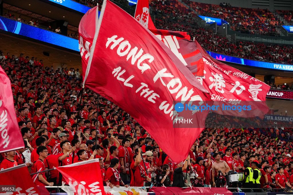 Passionate supporters wave red team colours, clap, and chant slogans to back Hong Kong, China during their FIFA ASEAN Cup Tier 2 match against Laos at Kai Tak Stadium on September 27, 2026 in Hong Kong, where a lively crowd of nearly 19,000 cheered on the home side. (Photo by Zulu Lo/TMHK via Nexpher Images)