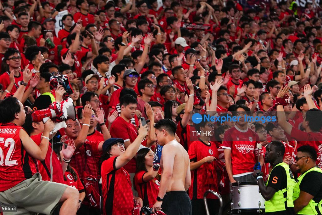 Passionate supporters wave red team colours, clap, and chant slogans to back Hong Kong, China during their FIFA ASEAN Cup Tier 2 match against Laos at Kai Tak Stadium on September 27, 2026 in Hong Kong, where a lively crowd of nearly 19,000 cheered on the home side. (Photo by Zulu Lo/TMHK via Nexpher Images)