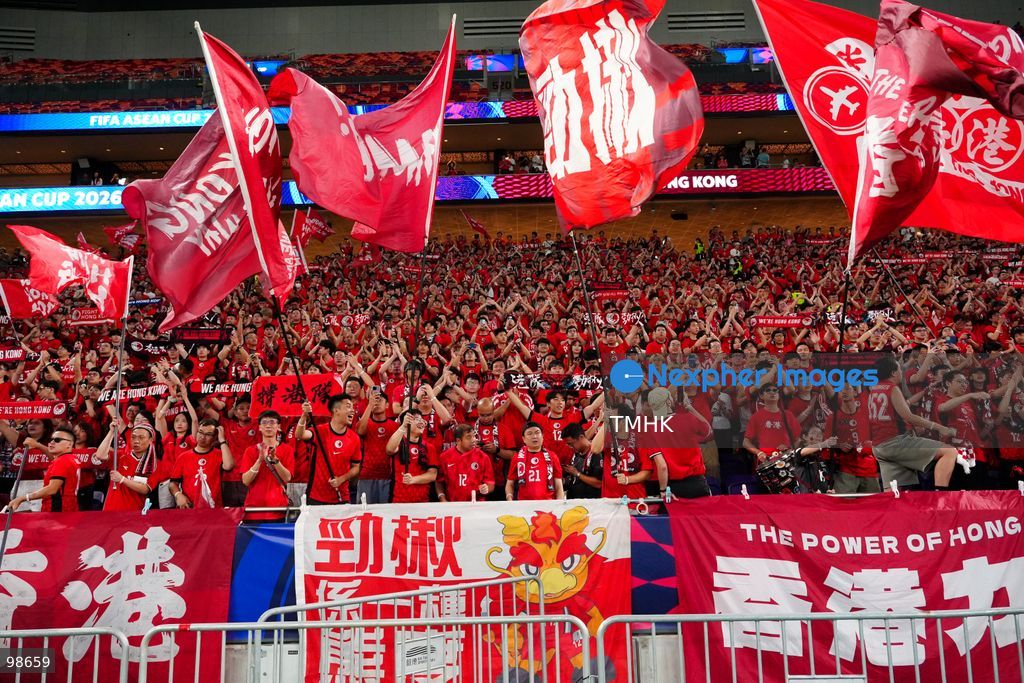 Passionate supporters wave red team colours, clap, and chant slogans to back Hong Kong, China during their FIFA ASEAN Cup Tier 2 match against Laos at Kai Tak Stadium on September 27, 2026 in Hong Kong, where a lively crowd of nearly 19,000 cheered on the home side. (Photo by Zulu Lo/TMHK via Nexpher Images)