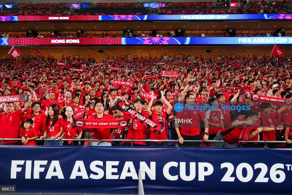 Passionate supporters wave red team colours, clap, and chant slogans to back Hong Kong, China during their FIFA ASEAN Cup Tier 2 match against Laos at Kai Tak Stadium on September 27, 2026 in Hong Kong, where a lively crowd of nearly 19,000 cheered on the home side. (Photo by Zulu Lo/TMHK via Nexpher Images)