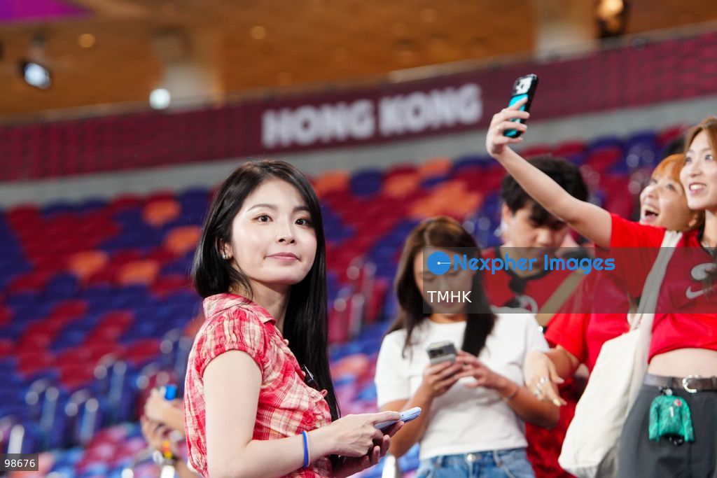 Passionate supporters wave red team colours, clap, and chant slogans to back Hong Kong, China during their FIFA ASEAN Cup Tier 2 match against Laos at Kai Tak Stadium on September 27, 2026 in Hong Kong, where a lively crowd of nearly 19,000 cheered on the home side. (Photo by Zulu Lo/TMHK via Nexpher Images)