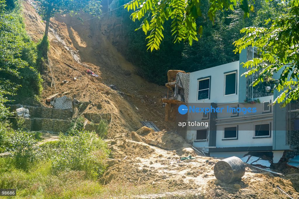 Lalitpur, Nepal —September 28, 2026: Heavy rainfall triggers a landslide that causes a house to collapse in Dhapakhel, Lalitpur, Nepal. The area experienced heavy rainfall throughout the day. (Photo by ap tolang/Nexpher Images)