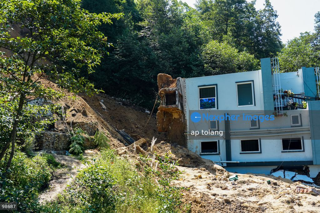 Lalitpur, Nepal —September 28, 2026: Heavy rainfall triggers a landslide that causes a house to collapse in Dhapakhel, Lalitpur, Nepal. The area experienced heavy rainfall throughout the day. (Photo by ap tolang/Nexpher Images)
