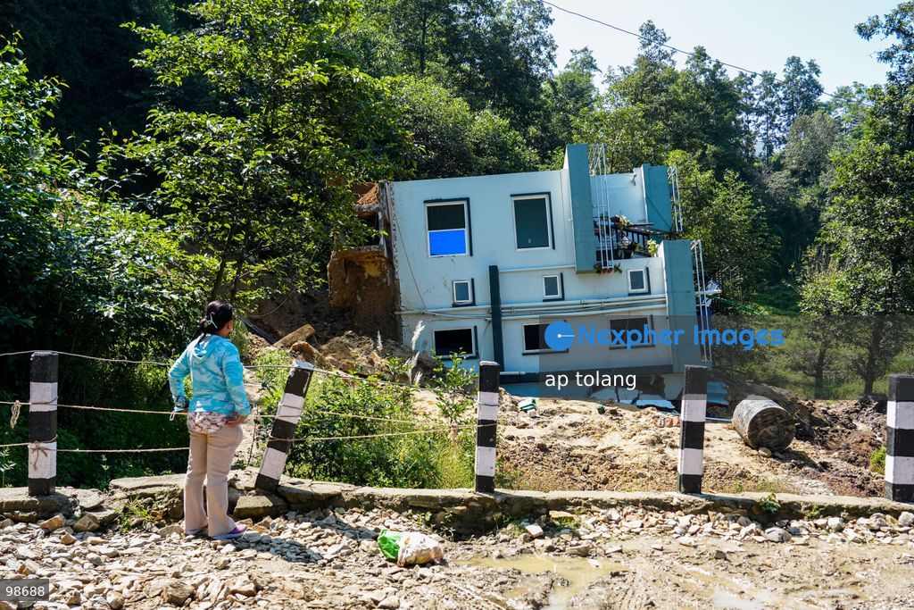 Lalitpur, Nepal —September 28, 2026: Heavy rainfall triggers a landslide that causes a house to collapse in Dhapakhel, Lalitpur, Nepal. The area experienced heavy rainfall throughout the day. (Photo by ap tolang/Nexpher Images)