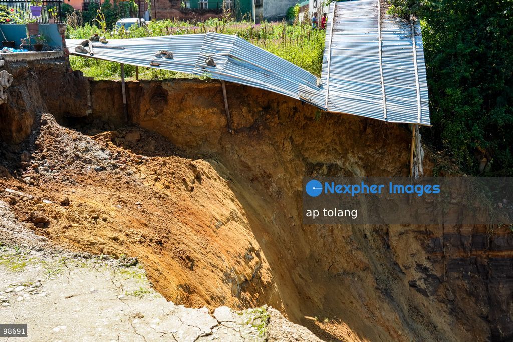 Lalitpur, Nepal —September 28, 2026: Heavy rainfall triggers a landslide that causes a house to collapse in Dhapakhel, Lalitpur, Nepal. The area experienced heavy rainfall throughout the day. (Photo by ap tolang/Nexpher Images)