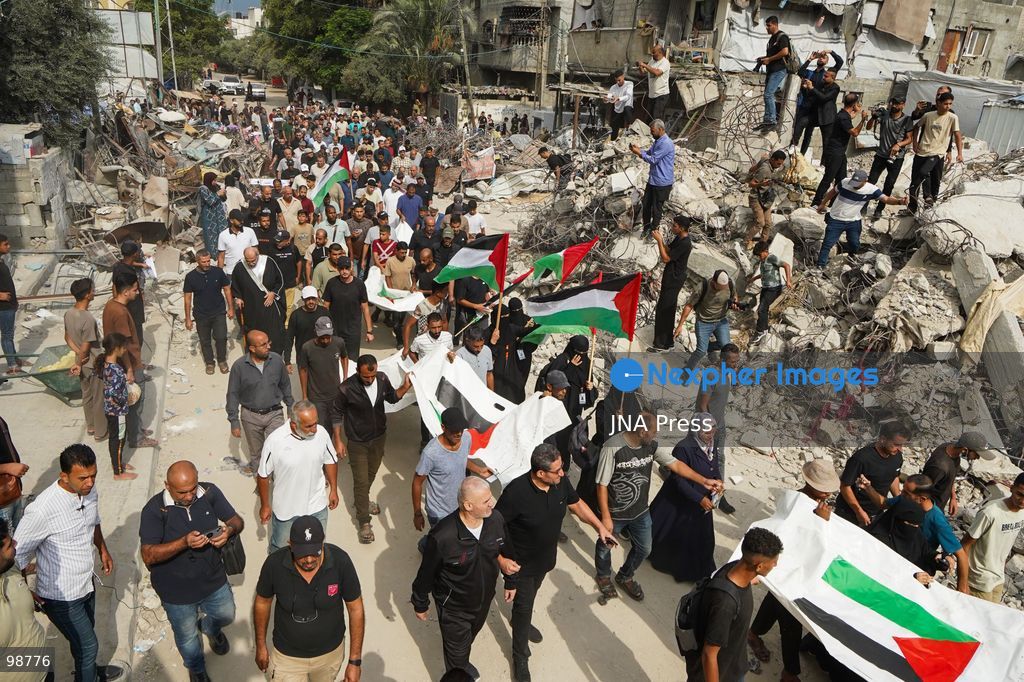 NUSEIRAT, GAZA STRIP, SEPTEMBER 29, 2026: Palestinians mourn during funeral ceremonies for victims whose remains were recovered from beneath the rubble of Al-Muhandisin Tower and other destroyed homes in the Nuseirat refugee camp in the central Gaza Strip. Recovery teams have been searching through the ruins of Al-Muhandisin Tower, which was destroyed during the war, as families prepare to bury relatives whose remains had been trapped beneath the rubble for an extended period. Photo by Ramzi Abu Amer / JNA Press. (Photo by Ramzi Abu Amer/JNA Press via Nexpher Images)