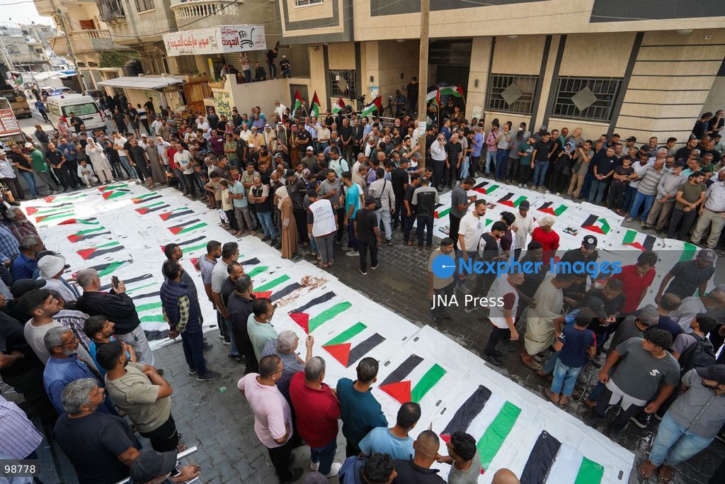 NUSEIRAT, GAZA STRIP, SEPTEMBER 29, 2026: Palestinians mourn during funeral ceremonies for victims whose remains were recovered from beneath the rubble of Al-Muhandisin Tower and other destroyed homes in the Nuseirat refugee camp in the central Gaza Strip. Recovery teams have been searching through the ruins of Al-Muhandisin Tower, which was destroyed during the war, as families prepare to bury relatives whose remains had been trapped beneath the rubble for an extended period. Photo by Ramzi Abu Amer / JNA Press. (Photo by Ramzi Abu Amer/JNA Press via Nexpher Images)