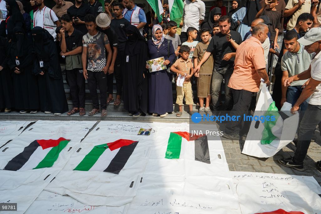 NUSEIRAT, GAZA STRIP, SEPTEMBER 29, 2026: Palestinians mourn during funeral ceremonies for victims whose remains were recovered from beneath the rubble of Al-Muhandisin Tower and other destroyed homes in the Nuseirat refugee camp in the central Gaza Strip. Recovery teams have been searching through the ruins of Al-Muhandisin Tower, which was destroyed during the war, as families prepare to bury relatives whose remains had been trapped beneath the rubble for an extended period. Photo by Ramzi Abu Amer / JNA Press. (Photo by Ramzi Abu Amer/JNA Press via Nexpher Images)