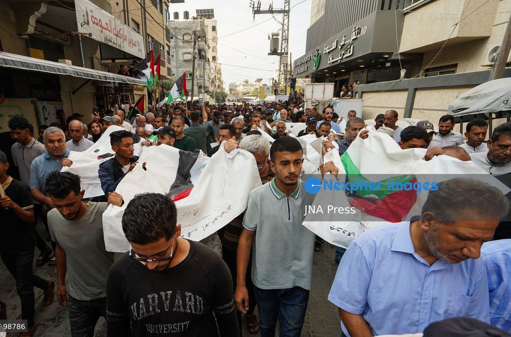 NUSEIRAT, GAZA STRIP, SEPTEMBER 29, 2026: Palestinians mourn during funeral ceremonies for victims whose remains were recovered from beneath the rubble of Al-Muhandisin Tower and other destroyed homes in the Nuseirat refugee camp in the central Gaza Strip. Recovery teams have been searching through the ruins of Al-Muhandisin Tower, which was destroyed during the war, as families prepare to bury relatives whose remains had been trapped beneath the rubble for an extended period. Photo by Ramzi Abu Amer / JNA Press. (Photo by Ramzi Abu Amer/JNA Press via Nexpher Images)