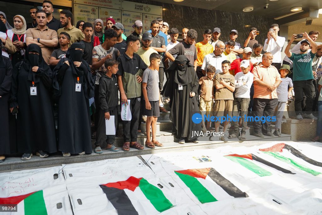 NUSEIRAT, GAZA STRIP, SEPTEMBER 29, 2026: Palestinians mourn during funeral ceremonies for victims whose remains were recovered from beneath the rubble of Al-Muhandisin Tower and other destroyed homes in the Nuseirat refugee camp in the central Gaza Strip. Recovery teams have been searching through the ruins of Al-Muhandisin Tower, which was destroyed during the war, as families prepare to bury relatives whose remains had been trapped beneath the rubble for an extended period. Photo by Ramzi Abu Amer / JNA Press. (Photo by Ramzi Abu Amer/JNA Press via Nexpher Images)