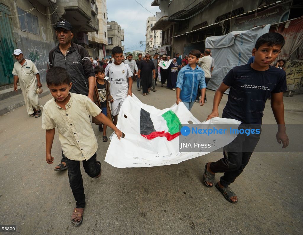 NUSEIRAT, GAZA STRIP, SEPTEMBER 29, 2026: Palestinians mourn during funeral ceremonies for victims whose remains were recovered from beneath the rubble of Al-Muhandisin Tower and other destroyed homes in the Nuseirat refugee camp in the central Gaza Strip. Recovery teams have been searching through the ruins of Al-Muhandisin Tower, which was destroyed during the war, as families prepare to bury relatives whose remains had been trapped beneath the rubble for an extended period. Photo by Ramzi Abu Amer / JNA Press. (Photo by Ramzi Abu Amer/JNA Press via Nexpher Images)