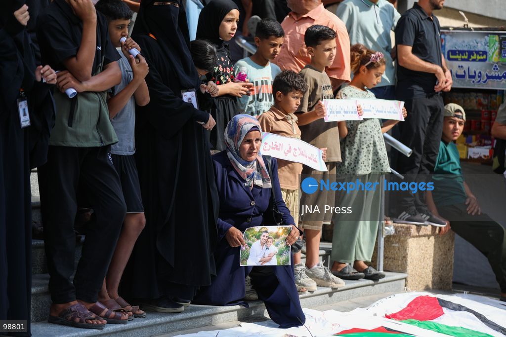 NUSEIRAT, GAZA STRIP, SEPTEMBER 29, 2026: Palestinians mourn during funeral ceremonies for victims whose remains were recovered from beneath the rubble of Al-Muhandisin Tower and other destroyed homes in the Nuseirat refugee camp in the central Gaza Strip. Recovery teams have been searching through the ruins of Al-Muhandisin Tower, which was destroyed during the war, as families prepare to bury relatives whose remains had been trapped beneath the rubble for an extended period. Photo by Ramzi Abu Amer / JNA Press. (Photo by Ramzi Abu Amer/JNA Press via Nexpher Images)