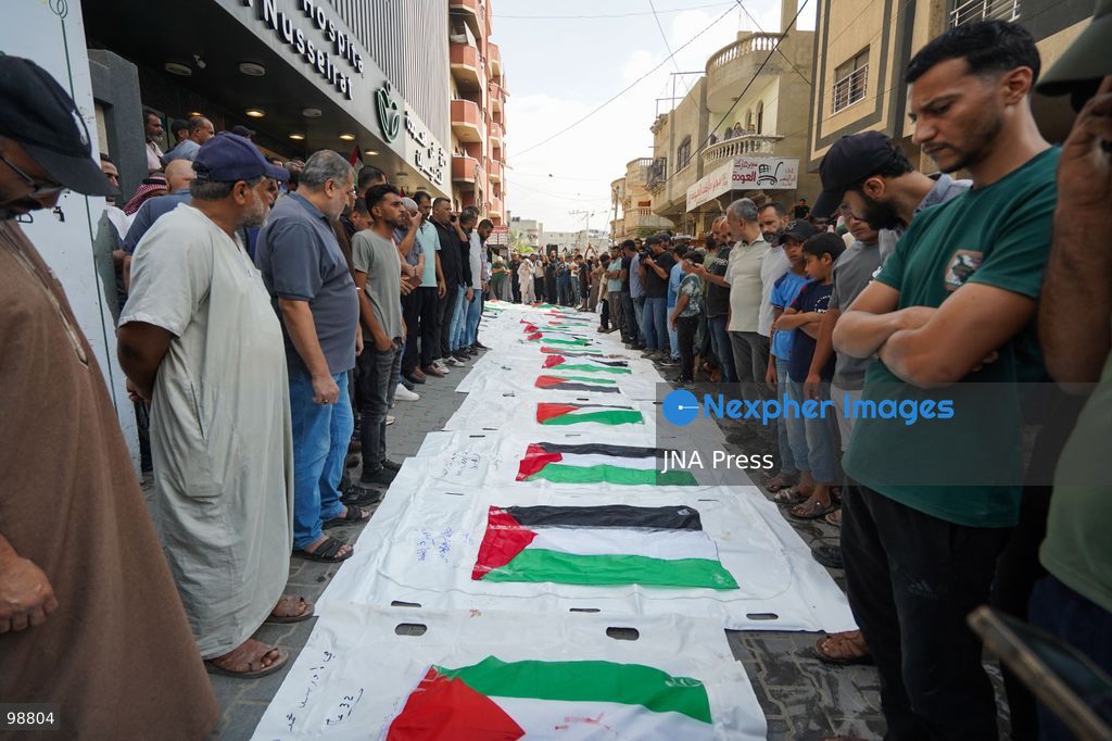 NUSEIRAT, GAZA STRIP, SEPTEMBER 29, 2026: Palestinians mourn during funeral ceremonies for victims whose remains were recovered from beneath the rubble of Al-Muhandisin Tower and other destroyed homes in the Nuseirat refugee camp in the central Gaza Strip. Recovery teams have been searching through the ruins of Al-Muhandisin Tower, which was destroyed during the war, as families prepare to bury relatives whose remains had been trapped beneath the rubble for an extended period. Photo by Ramzi Abu Amer / JNA Press. (Photo by Ramzi Abu Amer/JNA Press via Nexpher Images)