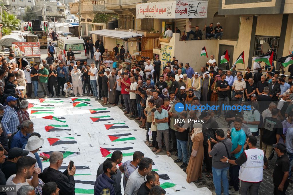 NUSEIRAT, GAZA STRIP, SEPTEMBER 29, 2026: Palestinians mourn during funeral ceremonies for victims whose remains were recovered from beneath the rubble of Al-Muhandisin Tower and other destroyed homes in the Nuseirat refugee camp in the central Gaza Strip. Recovery teams have been searching through the ruins of Al-Muhandisin Tower, which was destroyed during the war, as families prepare to bury relatives whose remains had been trapped beneath the rubble for an extended period. Photo by Ramzi Abu Amer / JNA Press. (Photo by Ramzi Abu Amer/JNA Press via Nexpher Images)