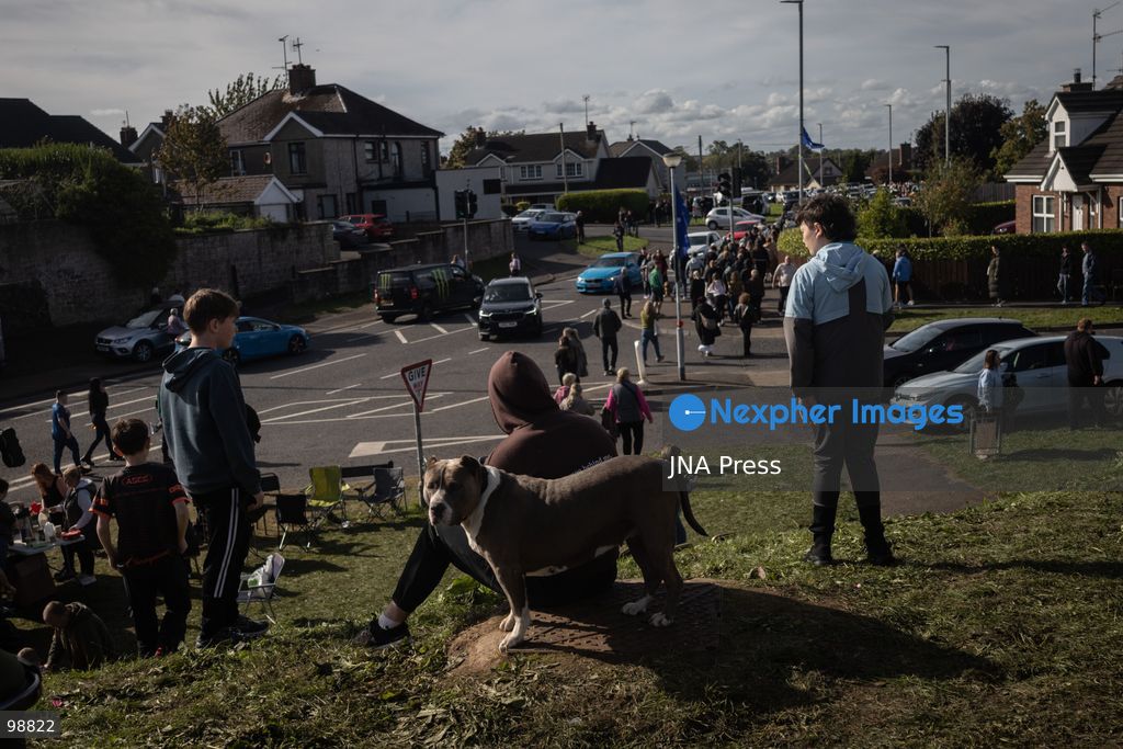 PORTADOWN, NORTHERN IRELAND, SEPTEMBER 28, 2026: Members of the Orange Order gather near Drumcree Parish Church as a standoff over the contentious Drumcree parade continues in Portadown. The Protestant fraternal organization had been granted conditional permission to march along the predominantly nationalist Garvaghy Road for the first time in nearly three decades, but the route was blocked by thousands of protesters and police prevented the parade from proceeding amid public safety concerns. On Monday, residents continued gathering on Garvaghy Road while Orange Order members remained near Drumcree Church as discussions continued with police and officials over the dispute. Photo by Nadia Caimi / JNA Press. (Photo by Nadia Caimi/JNA Press via Nexpher Images)