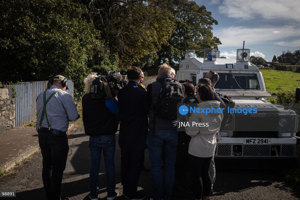 PORTADOWN, NORTHERN IRELAND, SEPTEMBER 28, 2026: Members of the Orange Order gather near Drumcree Parish Church as a standoff over the contentious Drumcree parade continues in Portadown. The Protestant fraternal organization had been granted conditional permission to march along the predominantly nationalist Garvaghy Road for the first time in nearly three decades, but the route was blocked by thousands of protesters and police prevented the parade from proceeding amid public safety concerns. On Monday, residents continued gathering on Garvaghy Road while Orange Order members remained near Drumcree Church as discussions continued with police and officials over the dispute. Photo by Nadia Caimi / JNA Press. (Photo by Nadia Caimi/JNA Press via Nexpher Images)