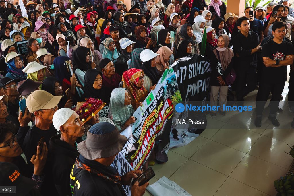 SUMEDANG, WEST JAVA, INDONESIA, SEPTEMBER 29, 2026: Residents from villages around Mount Tampomas, joined by students and civil society groups, take part in a protest in Sumedang, West Java, raising concerns over geothermal development and ongoing agrarian disputes. Demonstrators from communities including Cinangerang, Cimarias, Mekarahayu, Margalaksana and Tampomas called for agrarian reform and alleged that geothermal activities were damaging local soil and affecting their livelihoods. Representatives of the communities also met with government officials on the same day to discuss their demands, with authorities pledging to address agrarian reform issues, according to the organizers. Photo by Razan Jayaputra Partadinata / JNA Press. (Photo by Razan Jayaputra Partadinata/JNA Press via Nexpher Images)