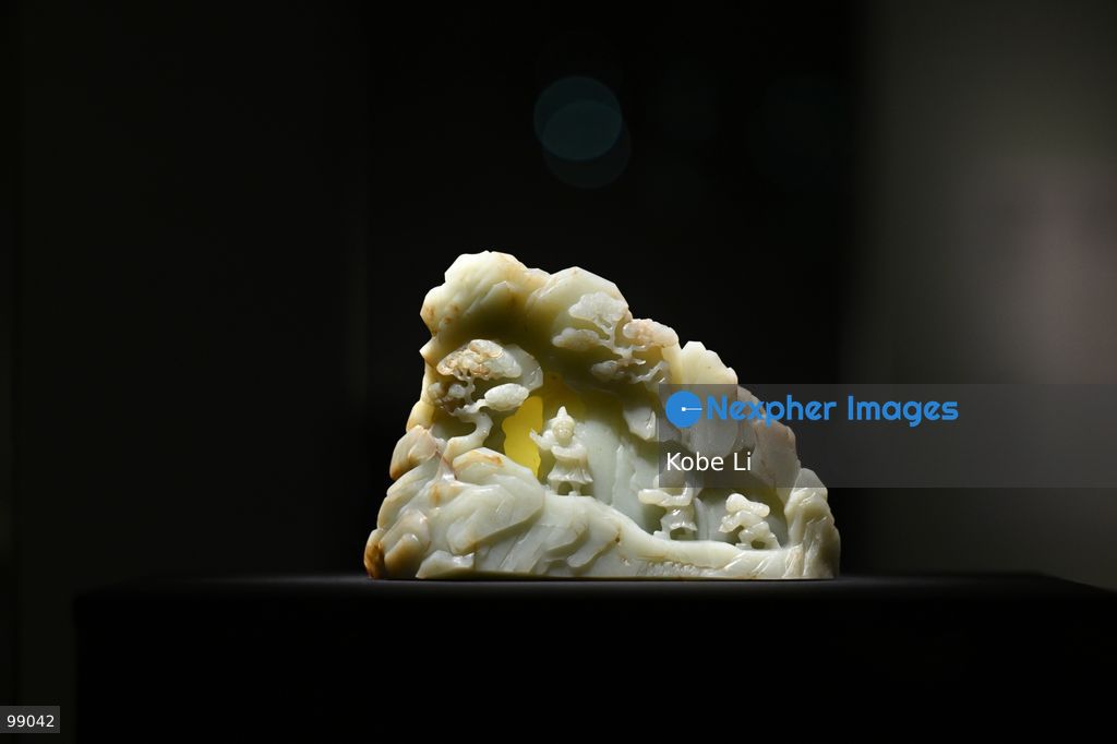 Miniature mountain (shan zi) with jade-mining scene from the Palace Museum's 'Design for the Forbidden City: Imperial Workshops of the Qing Court' exhibition is displaying on September 29 in Hong Kong. (Photo by Kobe Li/Nexpher Images)