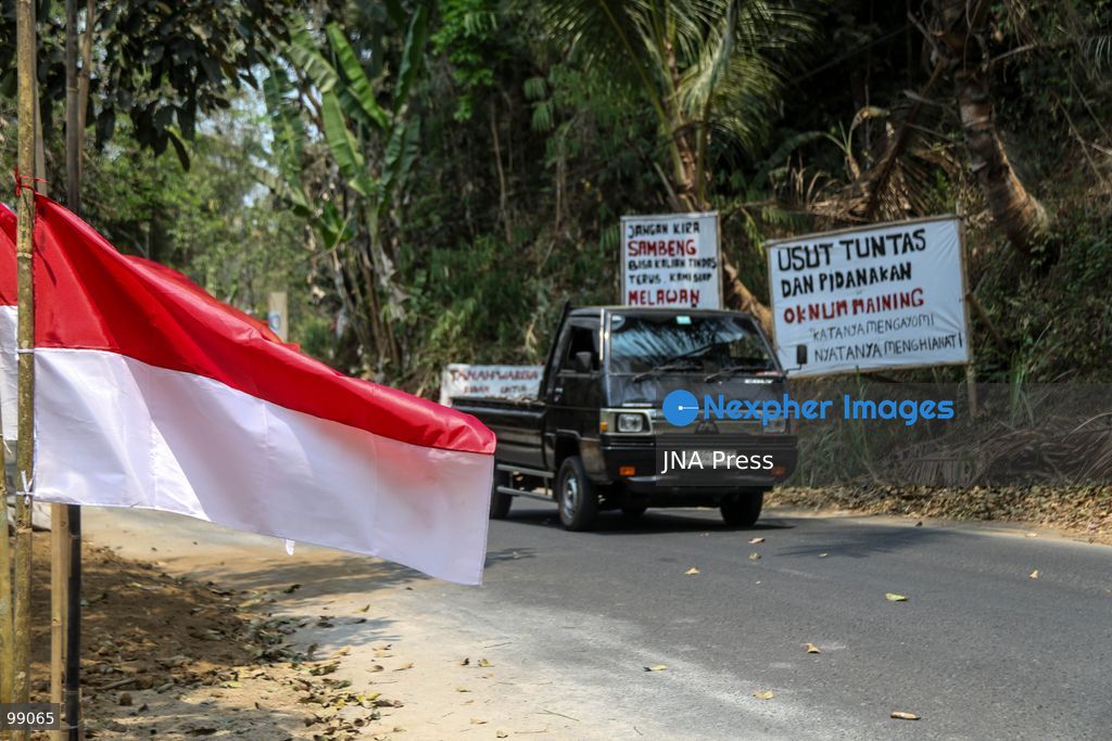 MAGELANG, CENTRAL JAVA, INDONESIA, SEPTEMBER 29, 2026: Indonesian flags fly at half-mast along a road in Sambeng Village, Borobudur, as residents stage a symbolic protest against sand mining activities in the Progo River. Local residents say the mining threatens water sources and could damage the surrounding environment. Photo by Ilham Nur Arifin / JNA Press. (Photo by Ilham Nur Arifin/JNA Press via Nexpher Images)