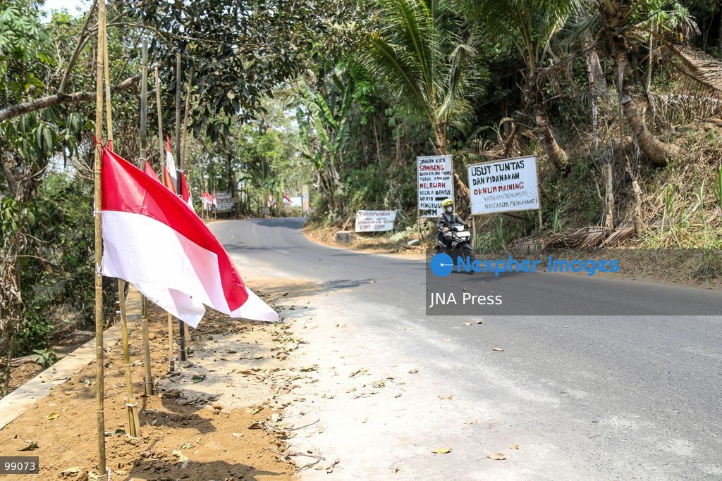 MAGELANG, CENTRAL JAVA, INDONESIA, SEPTEMBER 29, 2026: Indonesian flags fly at half-mast along a road in Sambeng Village, Borobudur, as residents stage a symbolic protest against sand mining activities in the Progo River. Local residents say the mining threatens water sources and could damage the surrounding environment. Photo by Ilham Nur Arifin / JNA Press. (Photo by Ilham Nur Arifin/JNA Press via Nexpher Images)