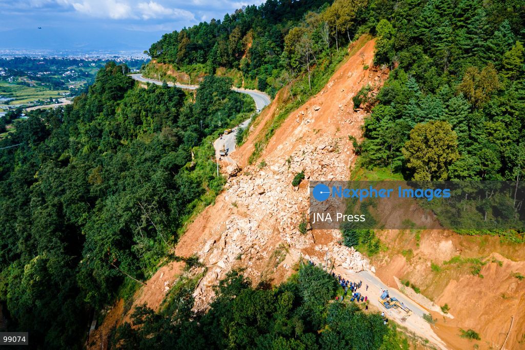 LALITPUR, NEPAL, SEPTEMBER 29, 2026: An aerial view shows a landslide blocking the Tikabhairab section of the Kanti Highway in Lalitpur following heavy rainfall. The landslide covered the roadway with mud and debris, disrupting traffic along the route. Photo by Ambir Tolang / JNA Press. (Photo by Ambir Tolang/JNA Press via Nexpher Images)