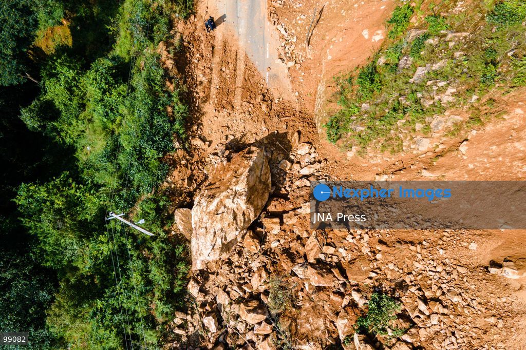 LALITPUR, NEPAL, SEPTEMBER 29, 2026: An aerial view shows a landslide blocking the Tikabhairab section of the Kanti Highway in Lalitpur following heavy rainfall. The landslide covered the roadway with mud and debris, disrupting traffic along the route. Photo by Ambir Tolang / JNA Press. (Photo by Ambir Tolang/JNA Press via Nexpher Images)