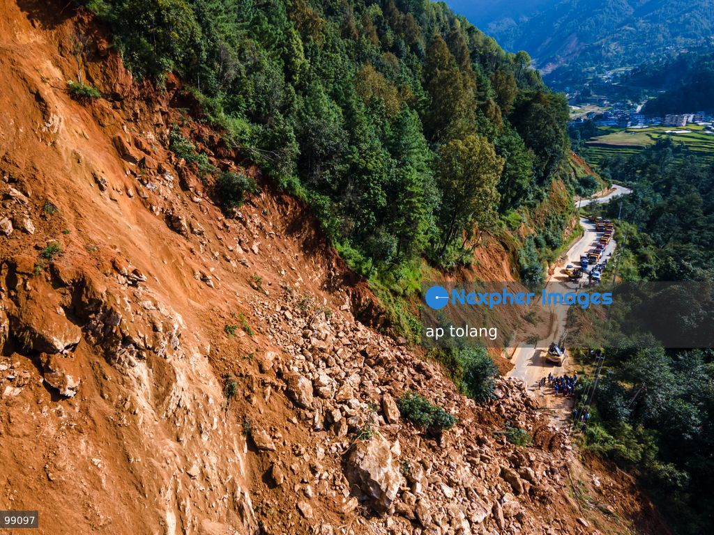 LALITPUR, NEPAL, SEPTEMBER 29, 2026: An aerial view shows a landslide blocking the Tikabhairab section of the Kanti Highway in Lalitpur following heavy rainfall. The landslide covered the roadway with mud and debris, disrupting traffic along the route. (Photo by ap tolang/Nexpher Images)