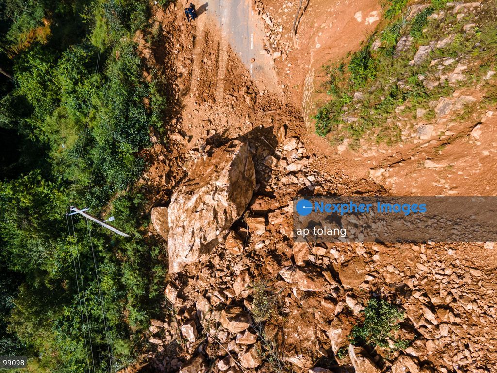 LALITPUR, NEPAL, SEPTEMBER 29, 2026: An aerial view shows a landslide blocking the Tikabhairab section of the Kanti Highway in Lalitpur following heavy rainfall. The landslide covered the roadway with mud and debris, disrupting traffic along the route. (Photo by ap tolang/Nexpher Images)
