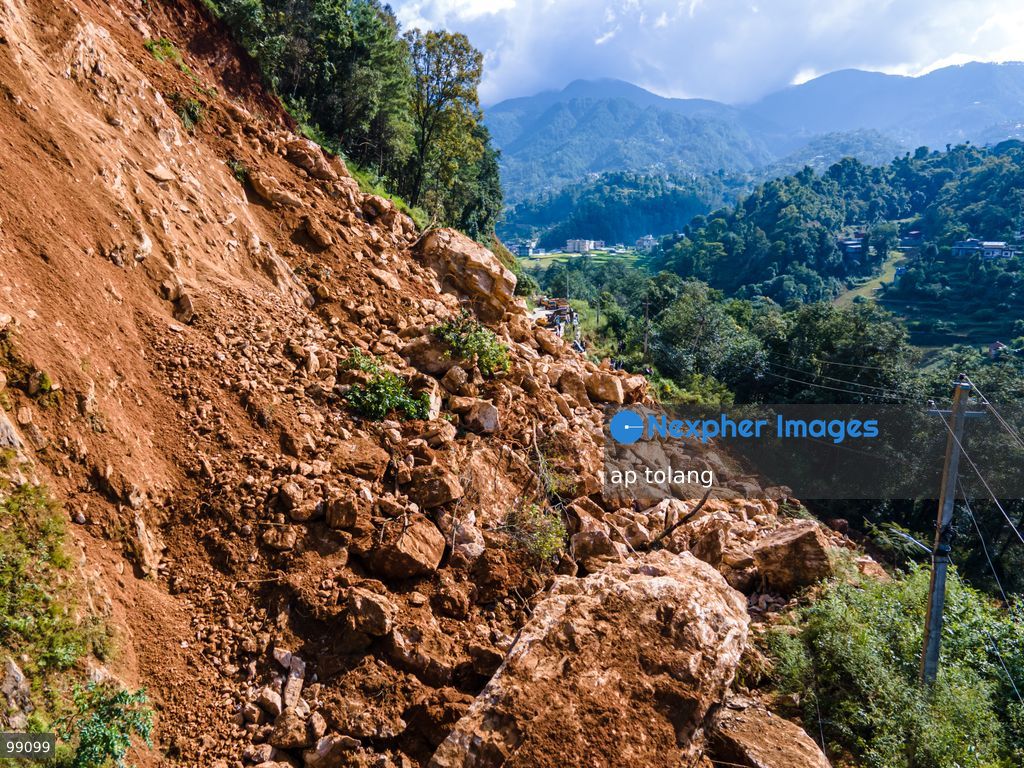 LALITPUR, NEPAL, SEPTEMBER 29, 2026: An aerial view shows a landslide blocking the Tikabhairab section of the Kanti Highway in Lalitpur following heavy rainfall. The landslide covered the roadway with mud and debris, disrupting traffic along the route. (Photo by ap tolang/Nexpher Images)