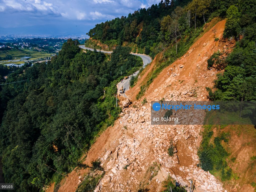 LALITPUR, NEPAL, SEPTEMBER 29, 2026: An aerial view shows a landslide blocking the Tikabhairab section of the Kanti Highway in Lalitpur following heavy rainfall. The landslide covered the roadway with mud and debris, disrupting traffic along the route. (Photo by ap tolang/Nexpher Images)