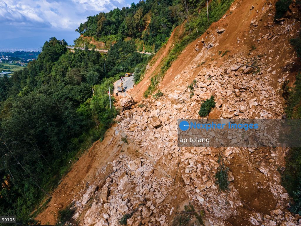 LALITPUR, NEPAL, SEPTEMBER 29, 2026: An aerial view shows a landslide blocking the Tikabhairab section of the Kanti Highway in Lalitpur following heavy rainfall. The landslide covered the roadway with mud and debris, disrupting traffic along the route. (Photo by ap tolang/Nexpher Images)