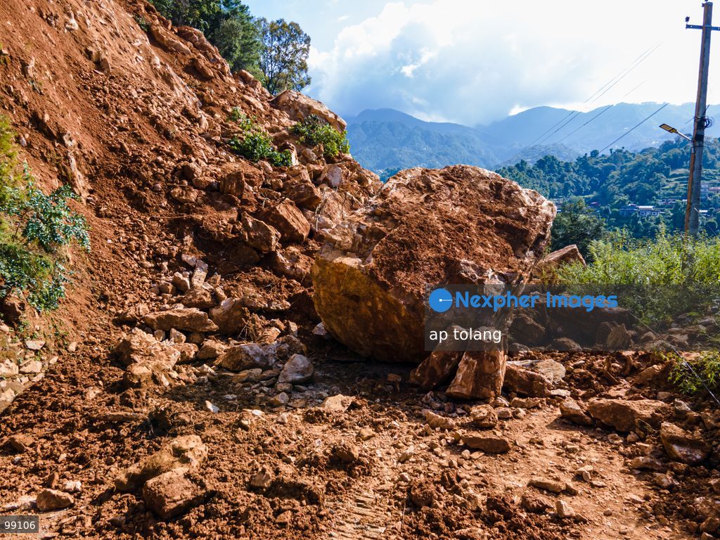 LALITPUR, NEPAL, SEPTEMBER 29, 2026: An aerial view shows a landslide blocking the Tikabhairab section of the Kanti Highway in Lalitpur following heavy rainfall. The landslide covered the roadway with mud and debris, disrupting traffic along the route. (Photo by ap tolang/Nexpher Images)
