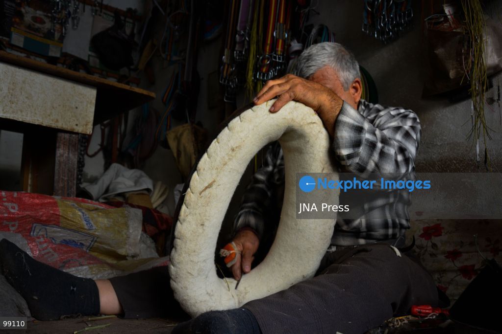 NIZIP, GAZIANTEP, TÜRKİYE, SEPTEMBER 29, 2026: Traditional saddlemaker Müslüm Dokuyucu works on a handmade saddle at his workshop in Nizip, Gaziantep. Dokuyucu has practiced saddlemaking for more than 60 years and continues to produce and repair saddles by hand using traditional techniques, preserving a craft increasingly challenged by modern manufacturing methods. Photo by Bekir Can Sağlam / JNA Press. (Photo by Bekir Can Saglam/JNA Press via Nexpher Images)