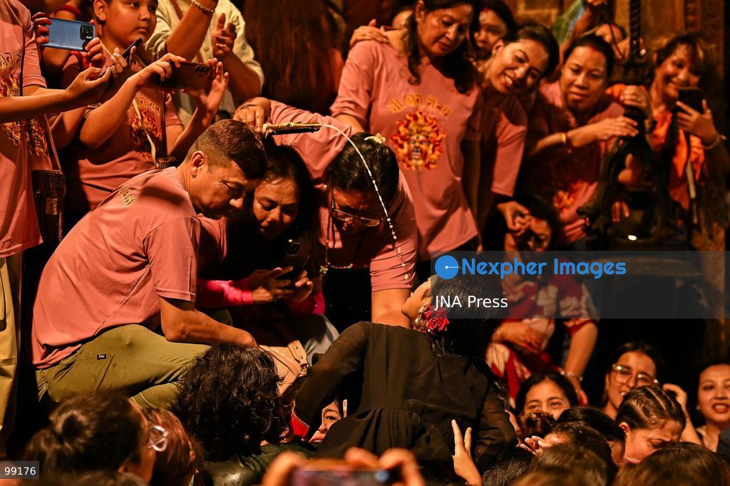 KATHMANDU, NEPAL, SEPTEMBER 29, 2026: Women pull the chariots carrying Kathmandu’s three living deities during Nanicha Ya, the final-day procession of the week-long Indra Jatra festival around Hanumandhoka and Kathmandu Durbar Square. Unlike the preceding chariot processions, traditionally led by men, Nanicha Ya marks the festival tradition in which women take over the pulling of the chariots carrying Royal Living Goddess Kumari Aryatara Shakya, Living God Ganesh and Living God Bhairav. Nepalese President Ram Chandra Paudel attended the concluding ceremonies at Hanumandhoka, receiving tika and prasad from the Kumari. The final-day celebrations also included traditional music, Dashavatar performances, members of the Nepali Army’s Gurju Paltan and religious rituals as devotees gathered to mark the conclusion of Indra Jatra. Photo by Safal Prakash Shrestha / JNA Press. (Photo by Safal Prakash Shrestha/JNA Press via Nexpher Images)