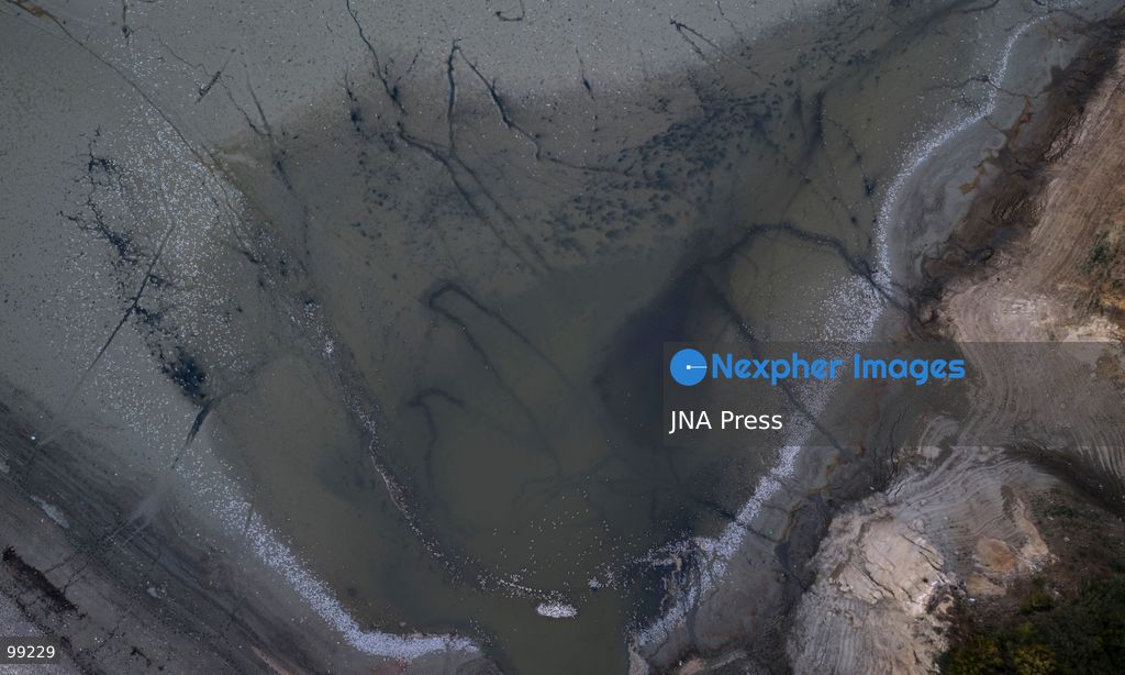 KASHARAJ, LUSHNJE, ALBANIA, SEPTEMBER 29, 2026: Large numbers of dead fish are seen at the Kasharaj Reservoir near Lushnje after its water level was drastically lowered during rehabilitation works on the reservoir's main outlet. Local media reported that the reduced water level left fish stranded in shallow pools and mud, resulting in widespread mortality. The reservoir is used to supply water for agricultural irrigation in the surrounding area. No official assessment of the number or total weight of dead fish had been released at the time of reporting. Photo by Vlasov Sulaj / JNA Press. (Photo by Vlasov Sulaj/JNA Press via Nexpher Images)