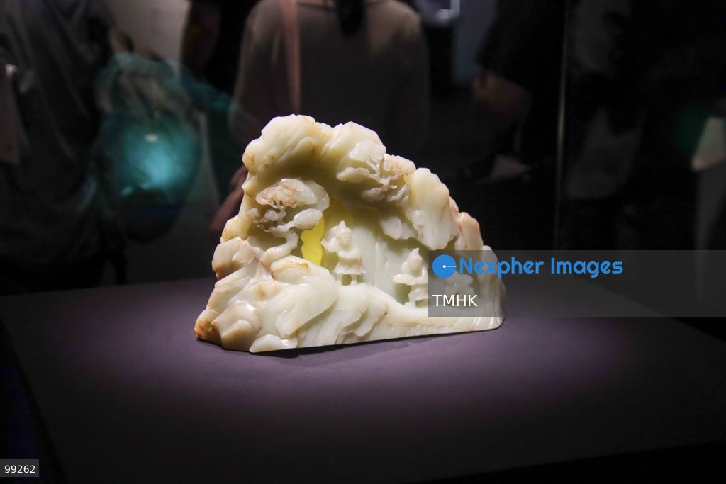 A close-up view shows a masterpiece crafted by the Qing Imperial Workshops on display inside a showcase at the "Design for the Forbidden City: Imperial Workshops of the Qing Court" exhibition at the Hong Kong Palace Museum on September 29, 2026 in Hong Kong. The exhibition explores traditional craftsmanship, material innovations, and court design aesthetics from the Qing dynasty. (Photo by Gordon Choi/TMHK via Nexpher Images)
