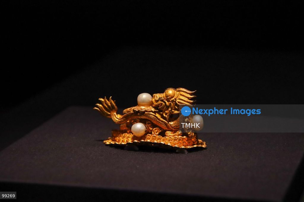 A close-up view shows a masterpiece crafted by the Qing Imperial Workshops on display inside a showcase at the "Design for the Forbidden City: Imperial Workshops of the Qing Court" exhibition at the Hong Kong Palace Museum on September 29, 2026 in Hong Kong. The exhibition explores traditional craftsmanship, material innovations, and court design aesthetics from the Qing dynasty. (Photo by Gordon Choi/TMHK via Nexpher Images)