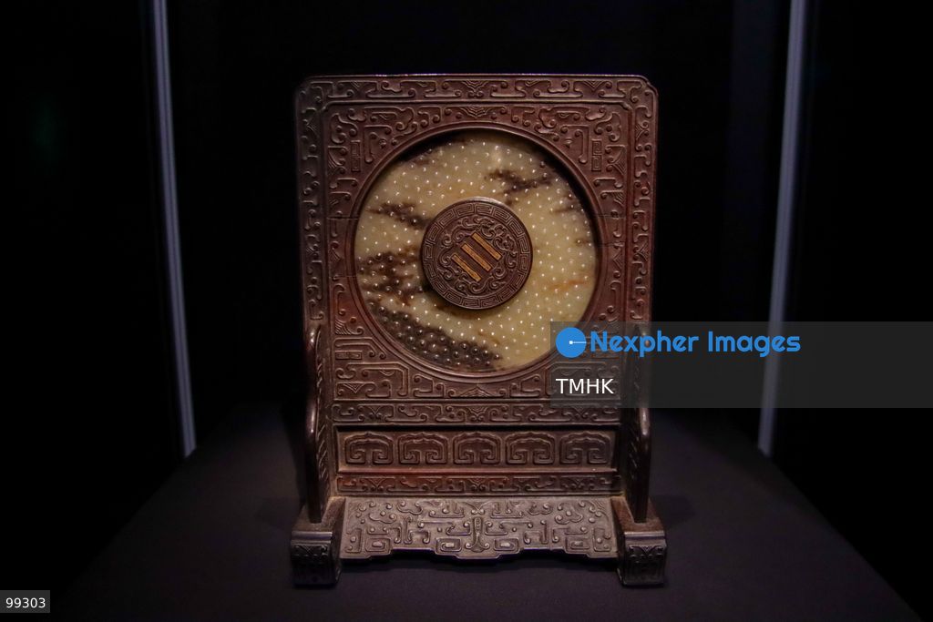 A close-up view shows a masterpiece crafted by the Qing Imperial Workshops on display inside a showcase at the "Design for the Forbidden City: Imperial Workshops of the Qing Court" exhibition at the Hong Kong Palace Museum on September 29, 2026 in Hong Kong. The exhibition explores traditional craftsmanship, material innovations, and court design aesthetics from the Qing dynasty. (Photo by Gordon Choi/TMHK via Nexpher Images)